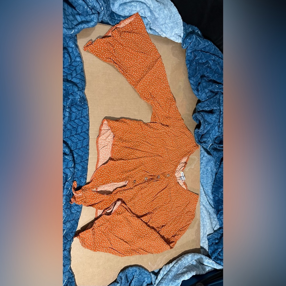 Orange spotted blouse